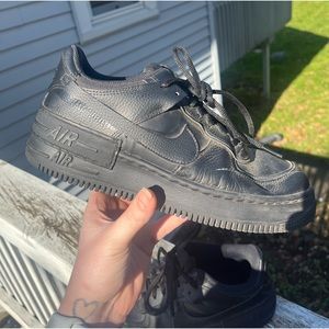 Black Nike AF1 low tops